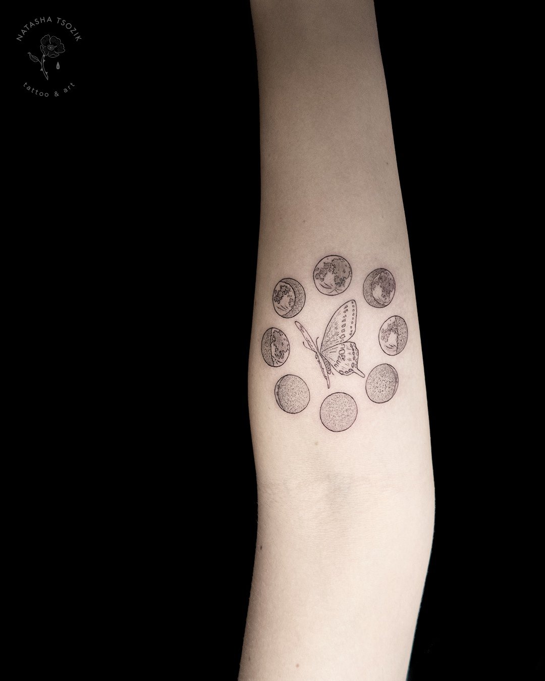 moon phases and butterfly fine line tattoo on forearm by Natasha Tsozik