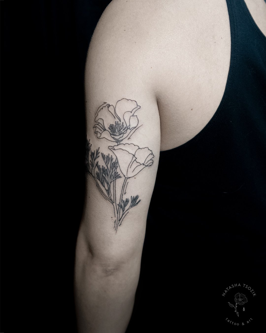 California Poppies fine line tattoo on bicep by Natasha Tsozik