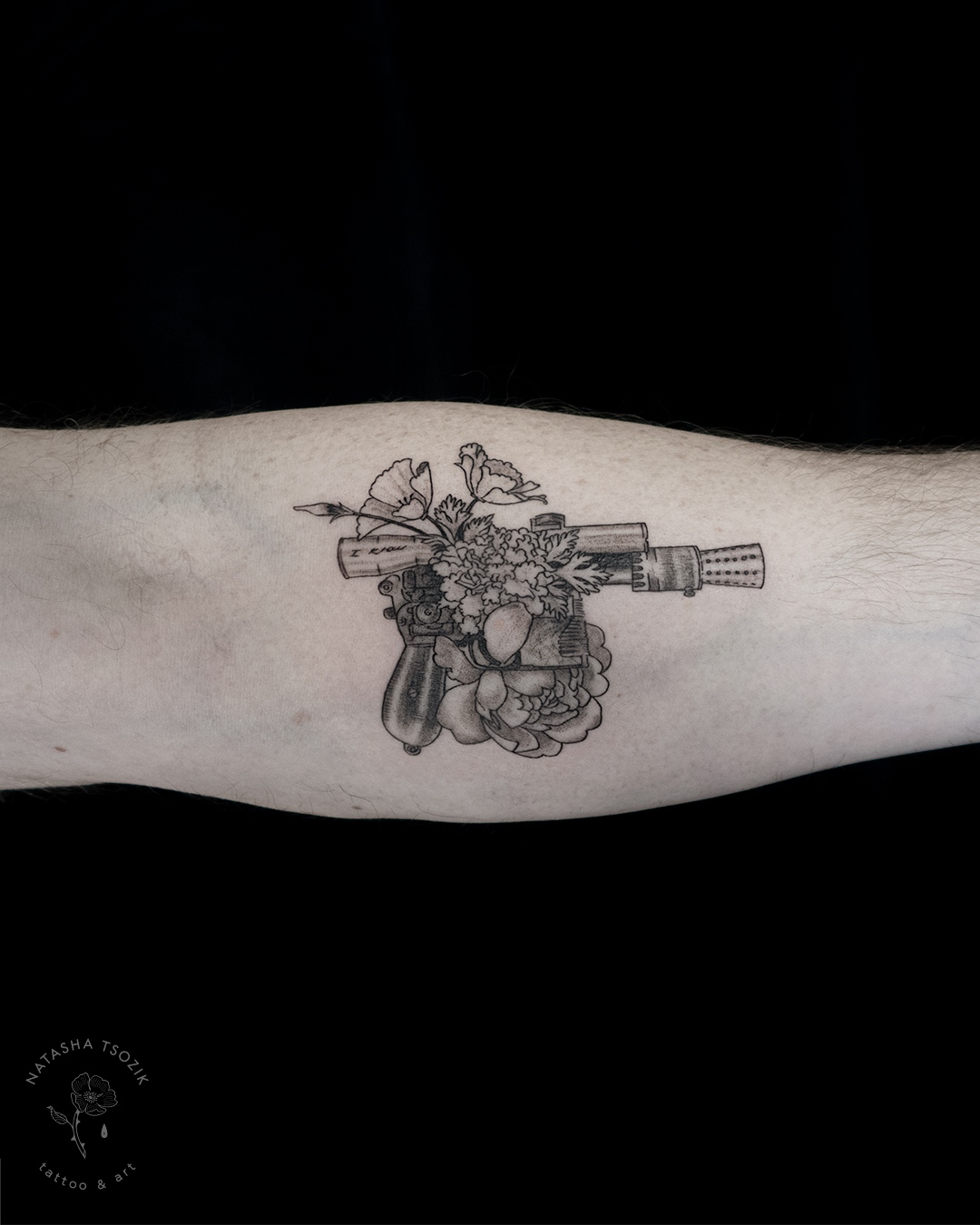 Star Wars Inspired Tattoos. Han Solo's gun with flowers fine line tattoo on a forearm by Natasha Tsozik