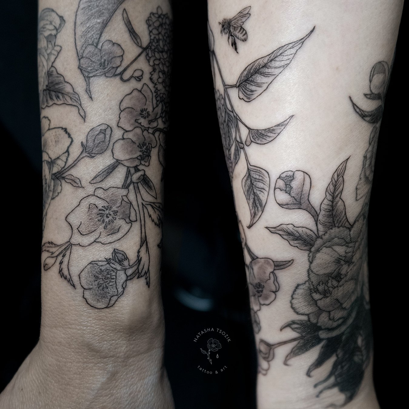 Details of a floral half-sleeve tattoo