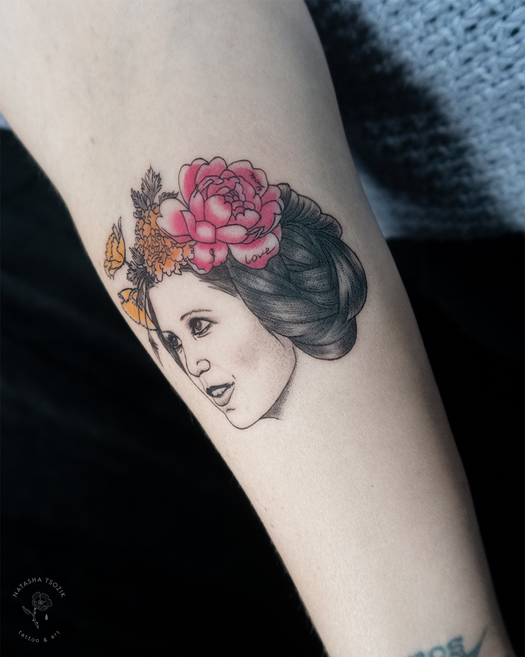 Star Wars Inspired Tattoos. Fine line tattoo on a forearm – a portrait of Princess Leia with flowers by Natasha Tsozik