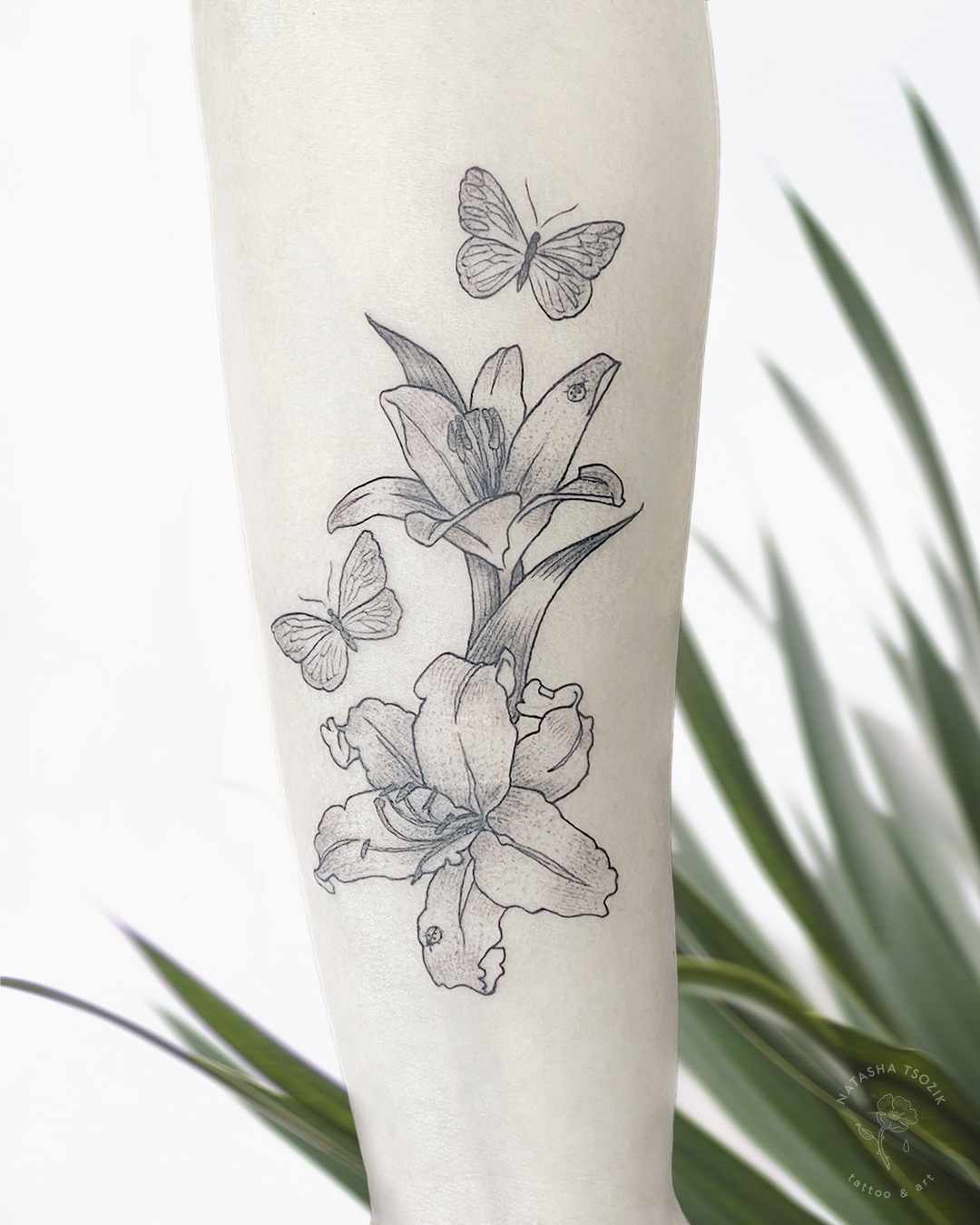 Fine line flower bouquet tattoo on the wrist
