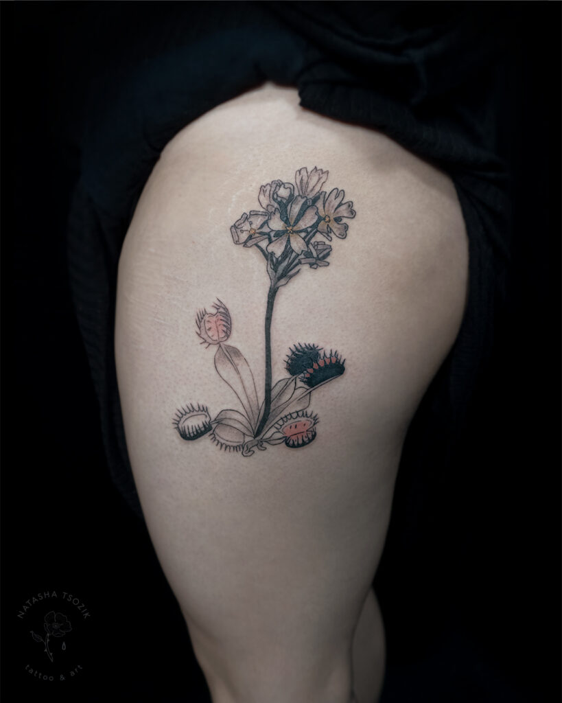 Venus Flytrap tattoo on a thigh