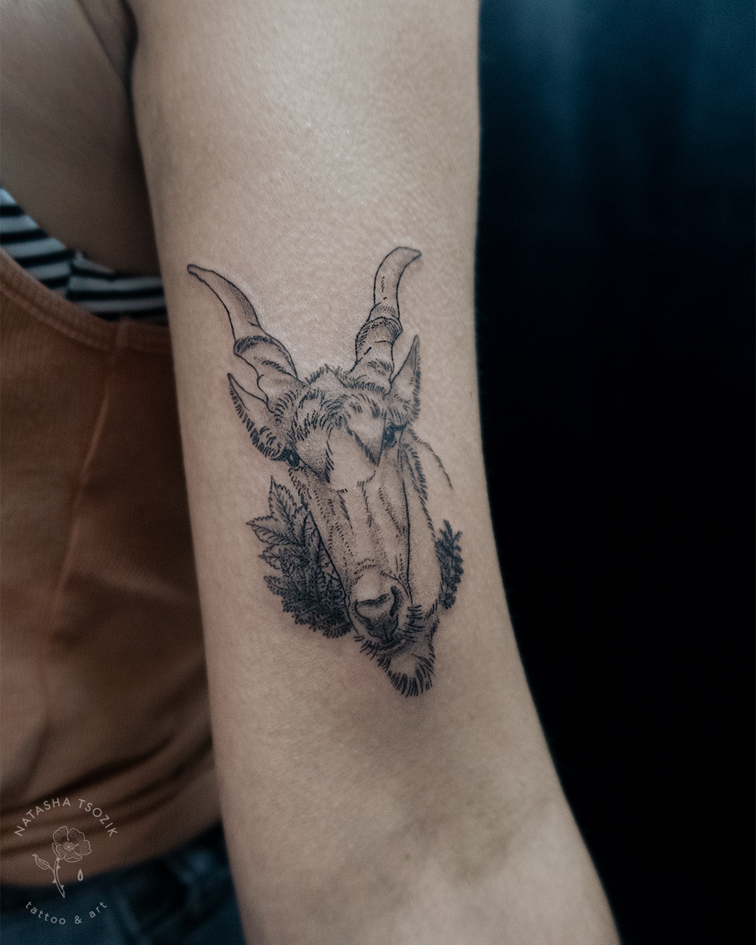 An eland tattoo on an inner bicep. Pet Portrait tattoos. 