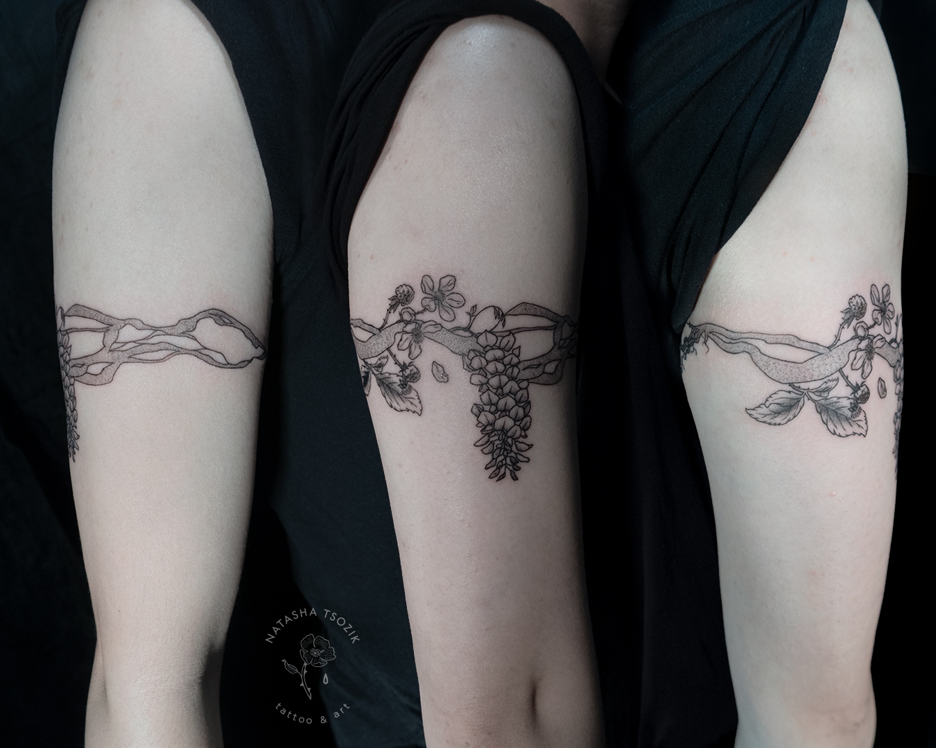 Botanical arm band tattoo.