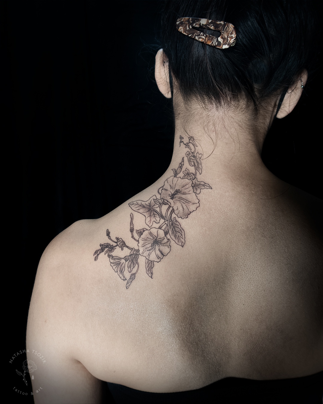Plant tattoo on a shoulder.