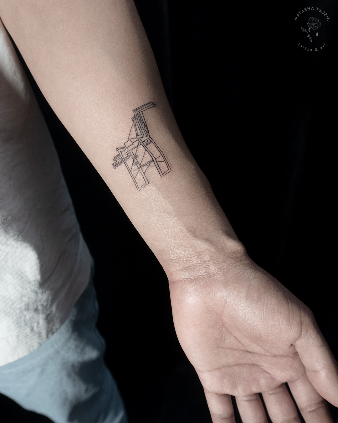Matching Oakland Crane tattoo by Natasha Tsozik
