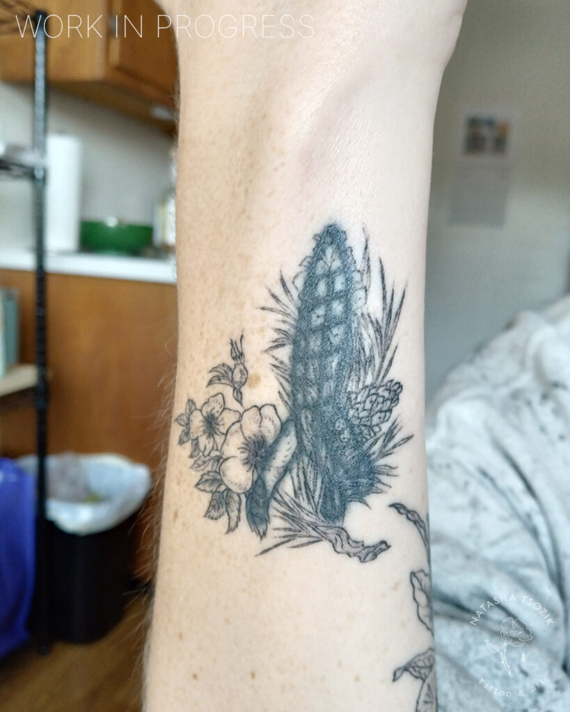 Work in progress tattoo on a forearm by Natasha Tsozik.