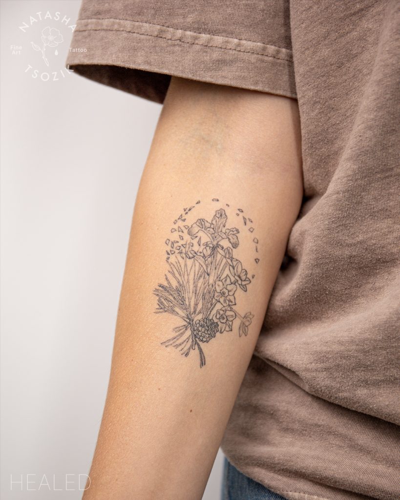 Healed memorial floral tattoo by Natasha Tsozik.